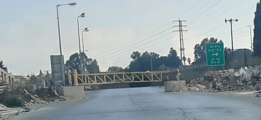 Village iron gate closed almost every day this week as army bulldozer razes nearby land to build a military camp