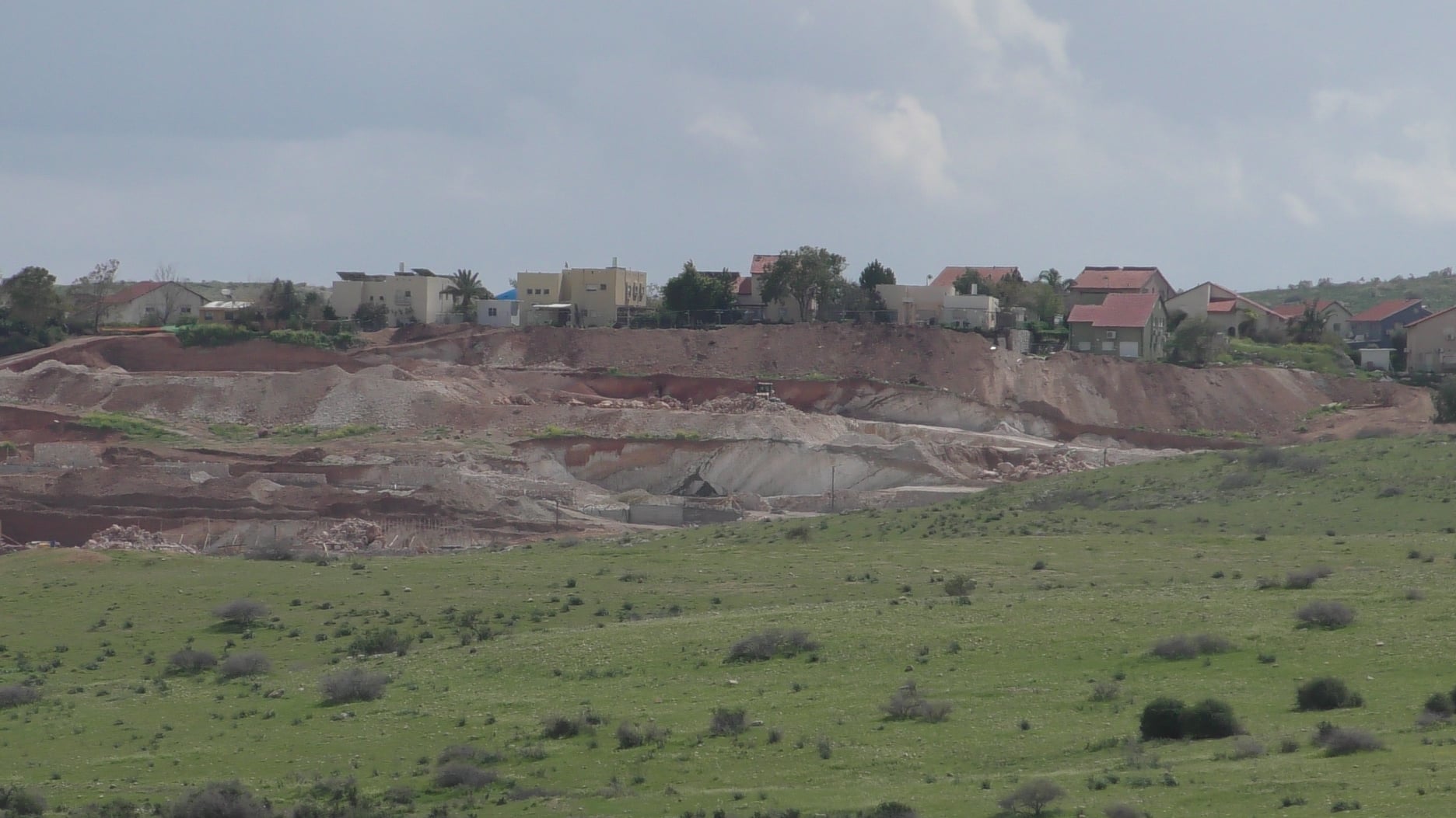 Israeli settlers set up housing units in the Jordan Valley