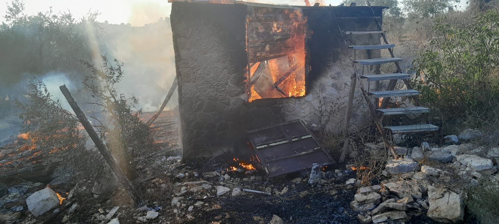 Colonists burn shack and olive trees southwest of Jenin