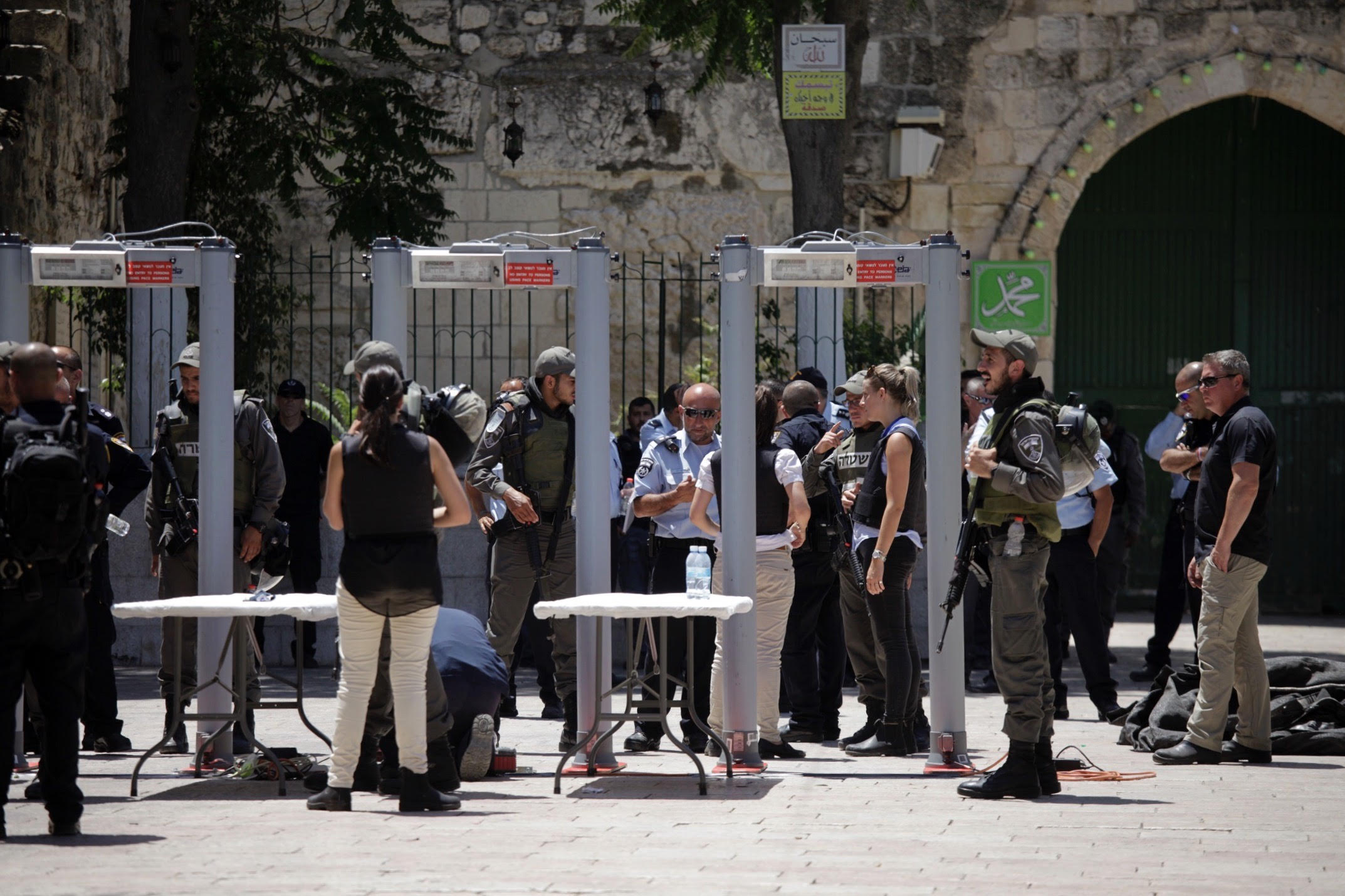 Israeli authorities begin work on road outside lions Gate in Jerusalem to re-install metal detectors 