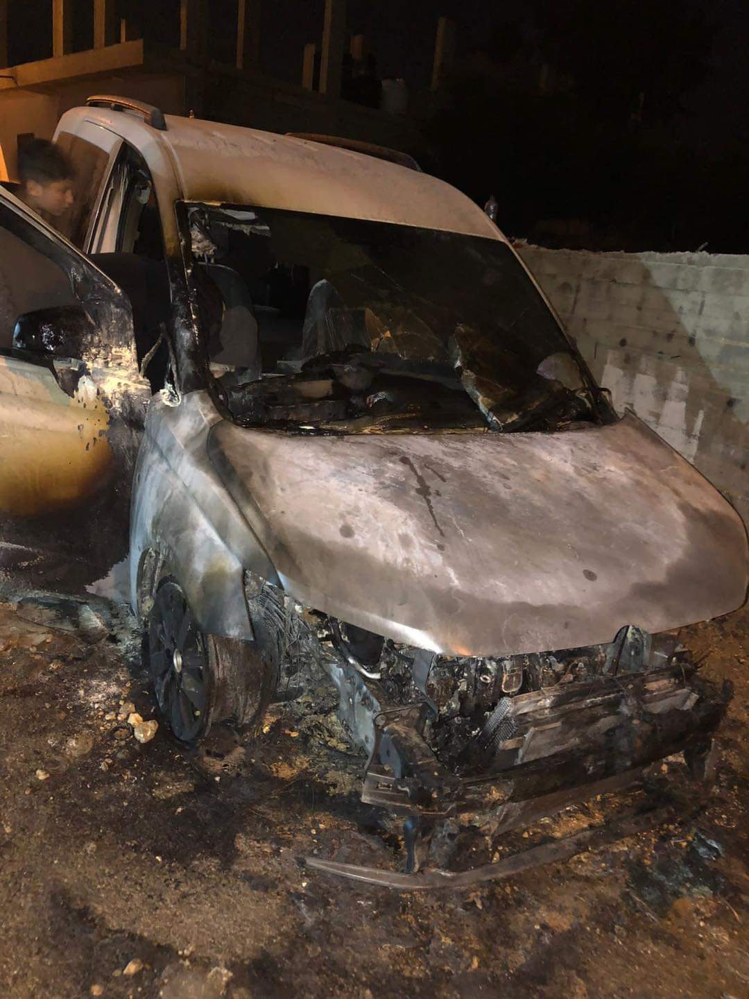 Israeli settlers set Palestinian-owned car on fire, attack commuters in north of West Bank