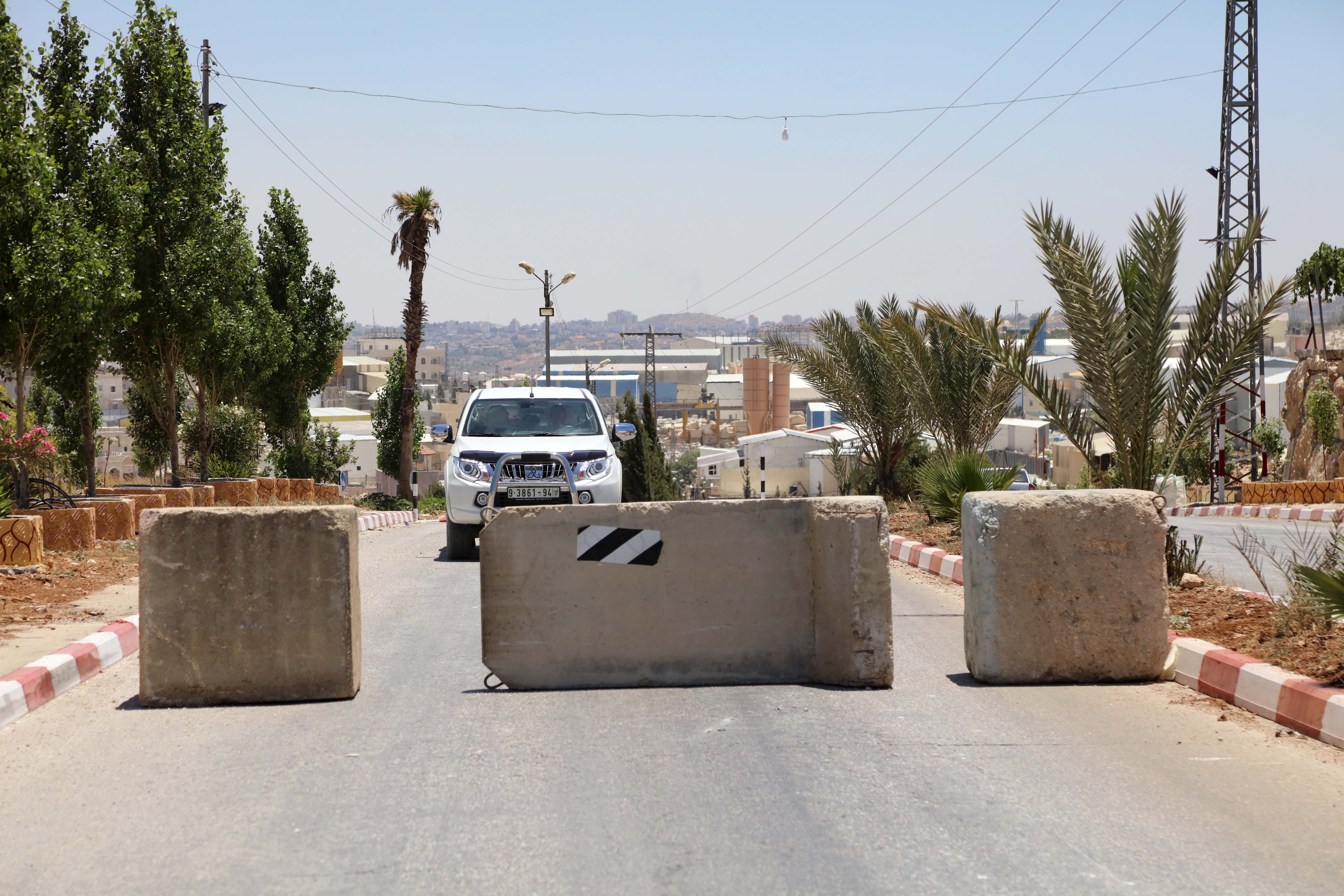 Major road in a northern West Bank village blocked by the Israeli army disrupting movement of residents