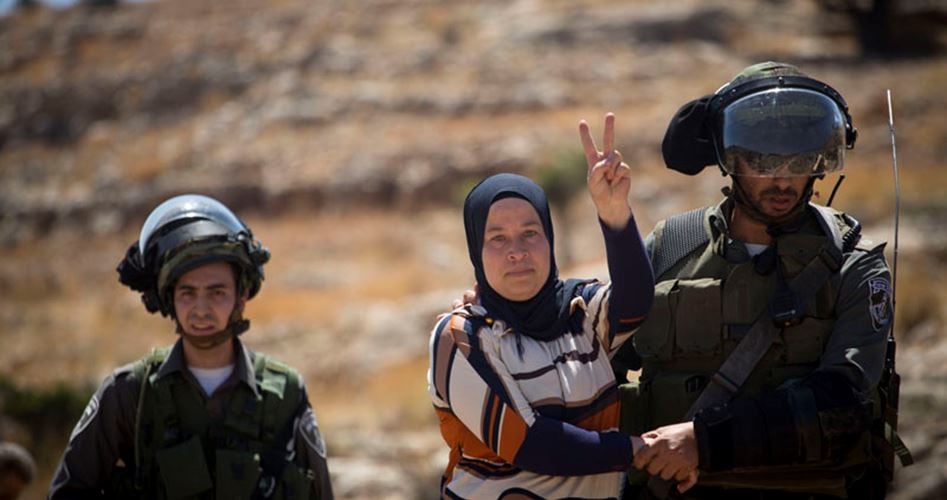 Palestinians demonstrate outside Damon Prison in support of women prisoners