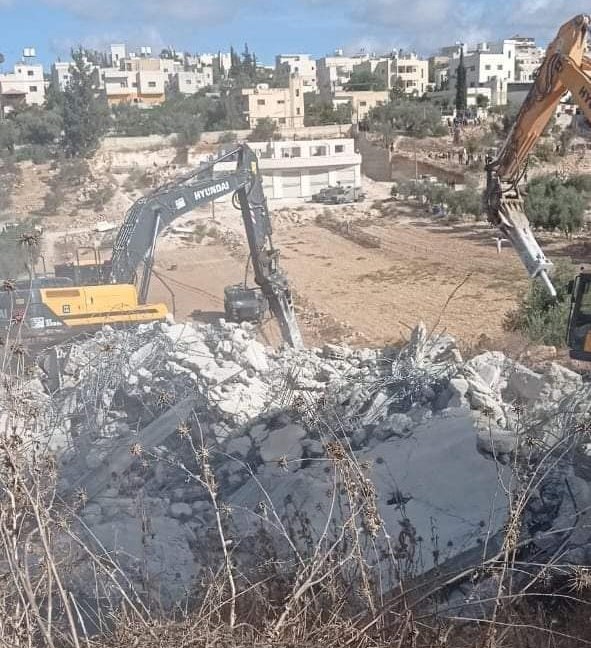 Israeli forces demolish several structures southwest of Hebron  