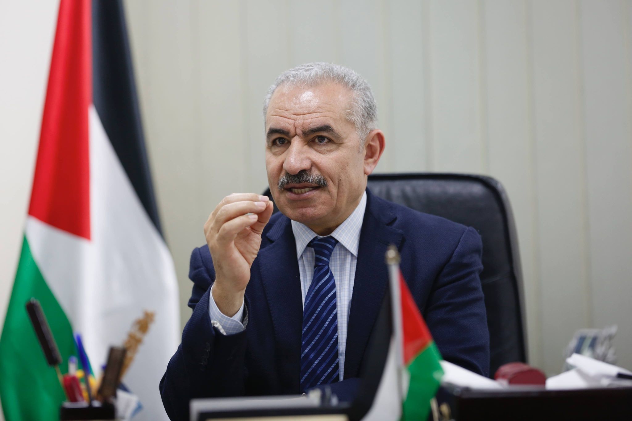 Prime Minister: Israel occupation and settlers exchange roles in committing crimes against us 