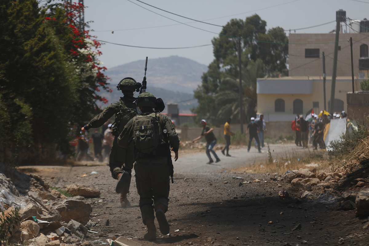 Two Palestinian youth shot, moderately injured during clashes in Jericho 
