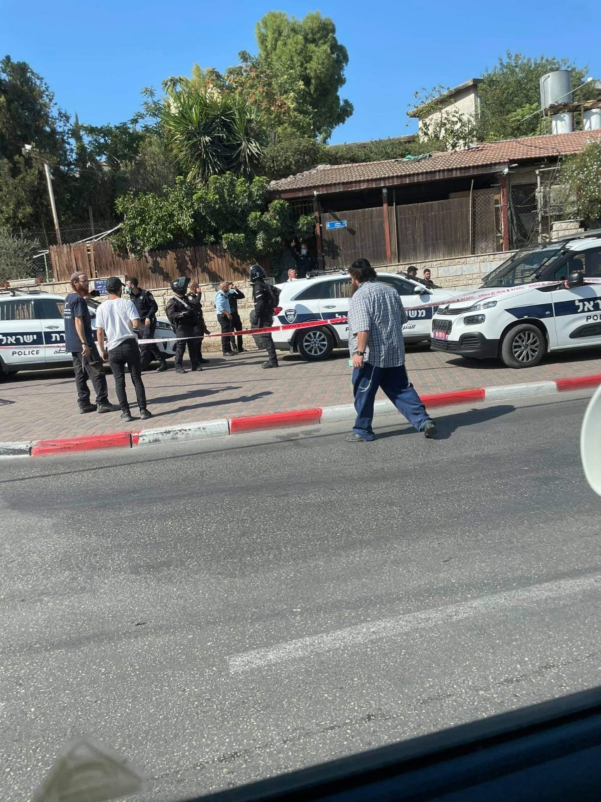 As four Sheikh Jarrah families await critical High Court ruling, 
Israeli settler opens fire, injures Palestinian