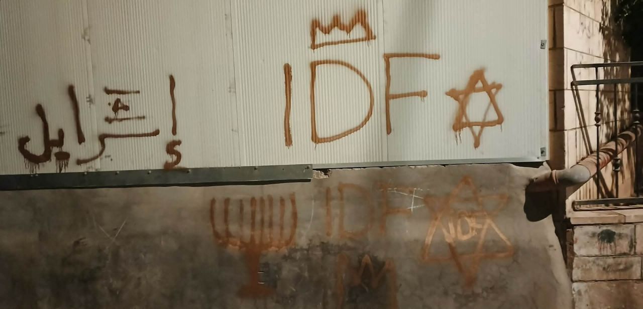 Israeli occupation soldiers spray-painted graffiti on the walls of homes during a raid into the town of Al-Khader, south of Bethlehem in the occupied West Bank.