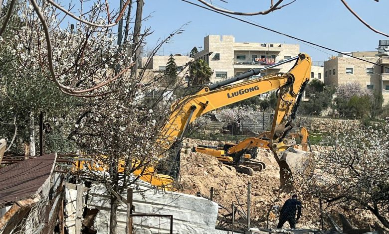 In an East Jerusalem neighborhood, Israeli occupation authorities demolish structures, raze land