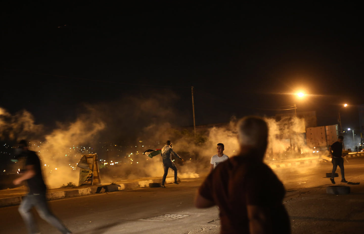 Dozens suffocate in late night clashes north of Hebron 