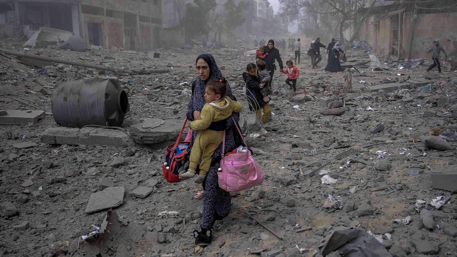 At least eleven civilians killed, others in Israeli airstrikes on school sheltering displaced persons south of Gaza City 