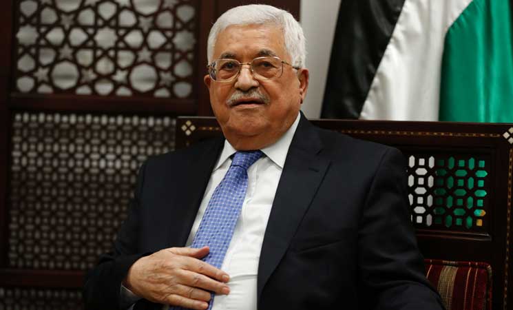 President Abbas mourns former Fatah official Hakam Balawi