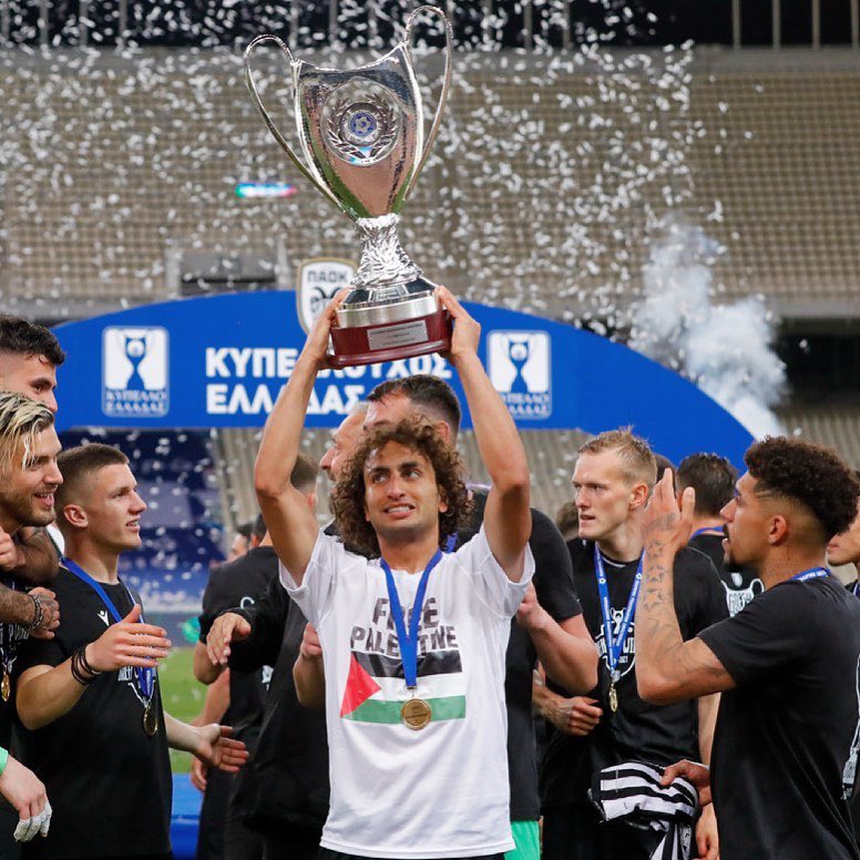 Egyptian footballer with a Greek club wears Palestine t-shirt upon winning cup