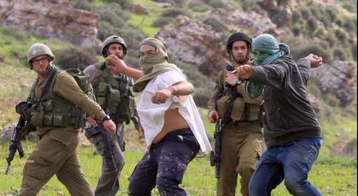 Israeli settlers continue their rampage in the occupied territories, attack a Palestinian family, commuters