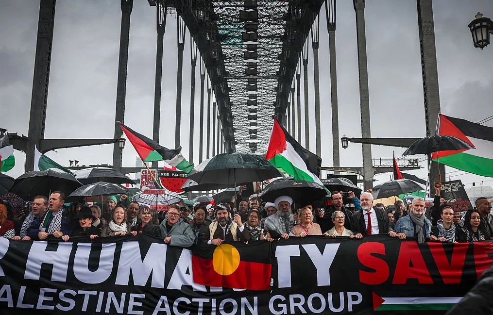 Tens of thousands march across Sydney Harbour Bridge calling for an end to genocide in Gaza