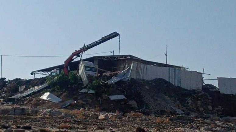 Israeli occupation forces demolish storehouses near Jerusalem