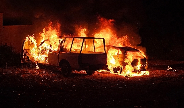 Extremist Israeli settlers set fire to parked vehicles, spray racist graffiti in Kafr Qasem 