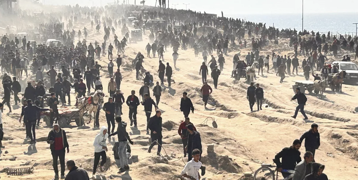 Israeli troops open fire on desperate Palestinians waiting for aid in Gaza City