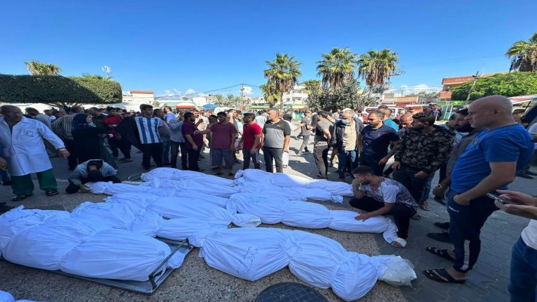 With mortuaries overwhelmed, hundreds of martyrs in Gaza buried in a mass grave  