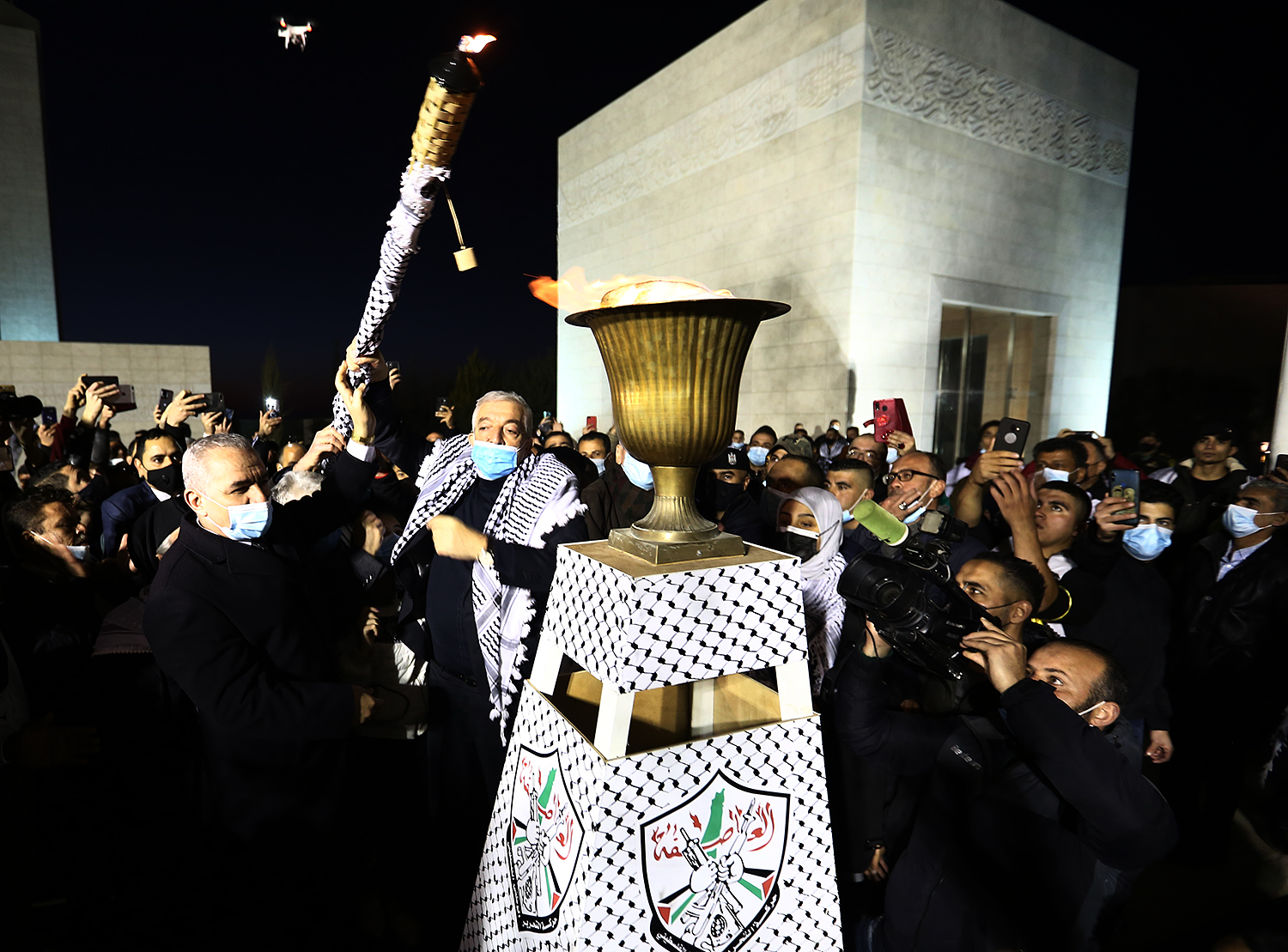 On behalf of President Abbas, Deputy Fatah leader lights torch marking 56th anniversary of contemporary revolution