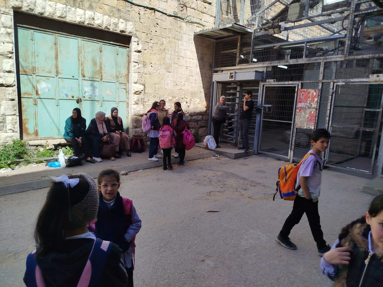 Israeli forces close checkpoint in Hebron, stranding Palestinian residents and schoolchildren
