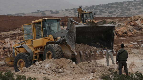 Israeli forces demolish cave, raze road near Bethlehem