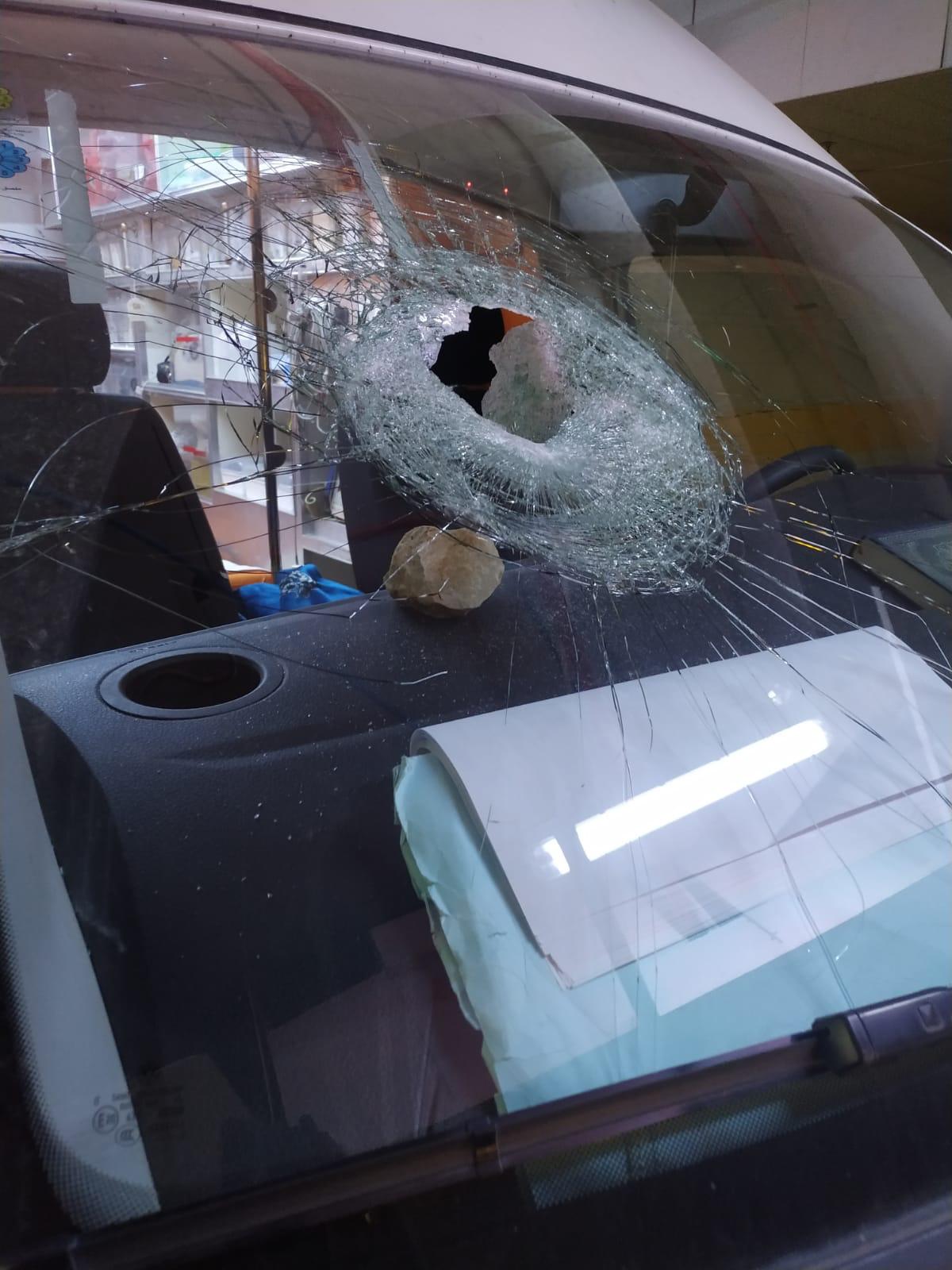 Israeli settlers attack a Palestinian ambulance in north of the West Bank injuring a woman occupant