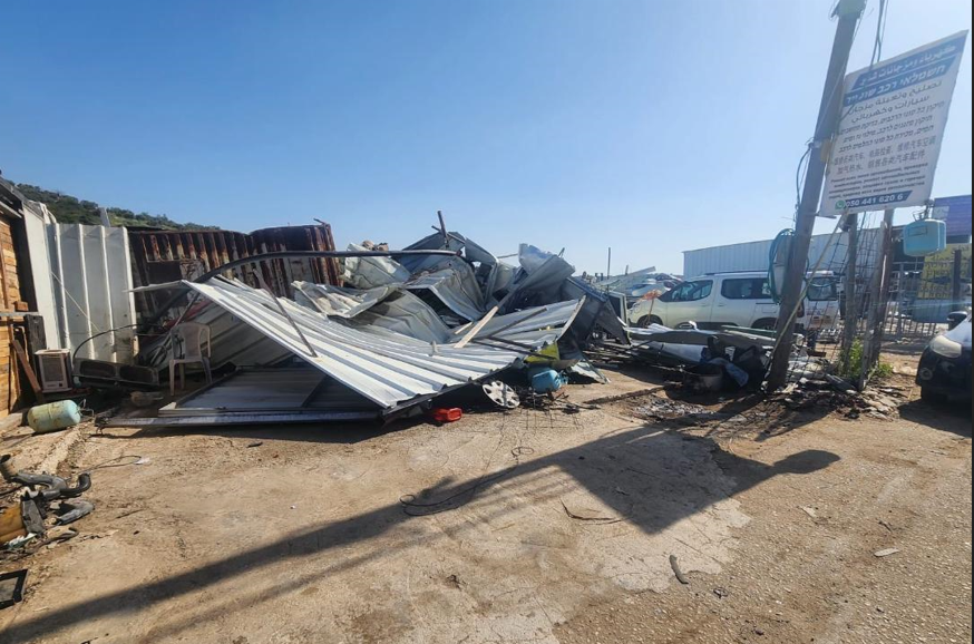 Israeli forces demolish three stores in northern West Bank town