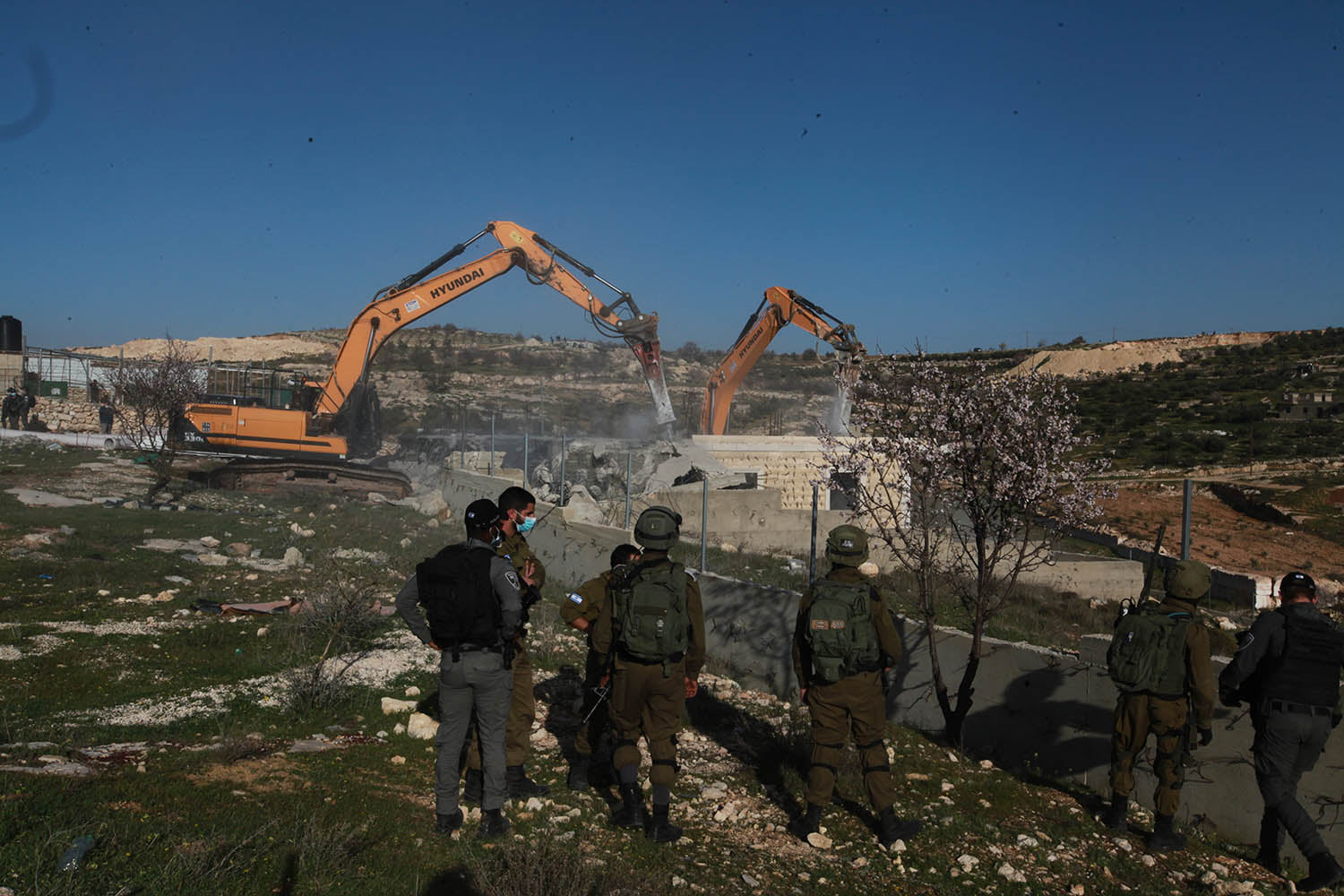 Israeli bulldozers demolish structures near Hebron
