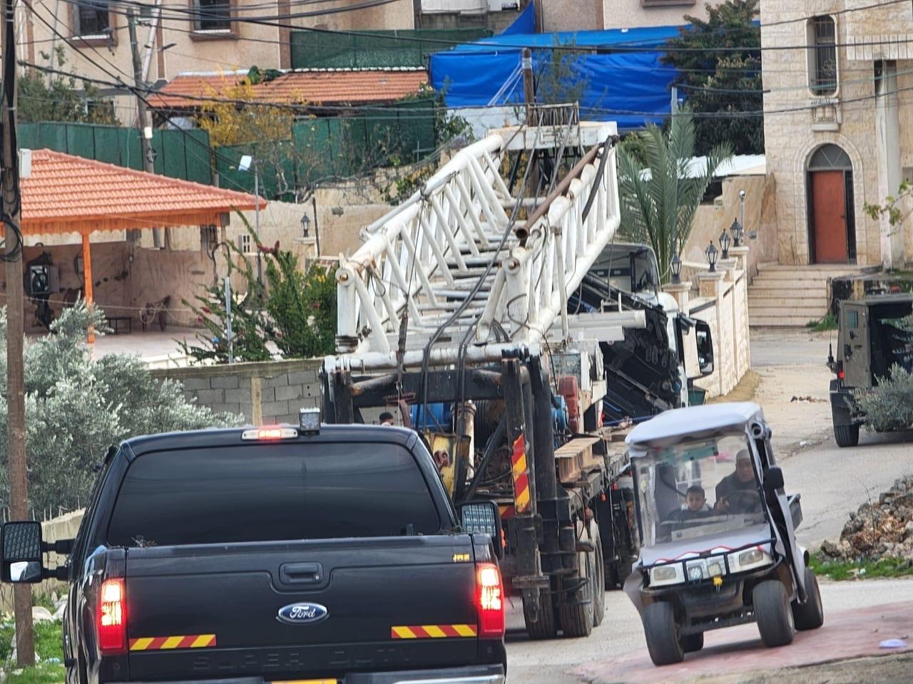Israeli forces seize equipment used to operate artesian well in Qarawat Bani Hassan, west of Salfit.