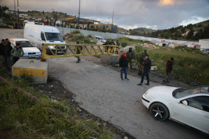 Israeli occupation blocks roads in northern West Bank villages, obstructing olive harvesting