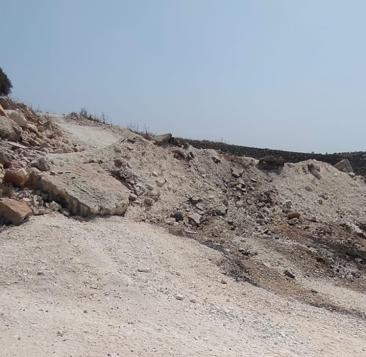 Agricultural road bulldozed by Israeli forces and closed with earth mounds in north of West Bank
