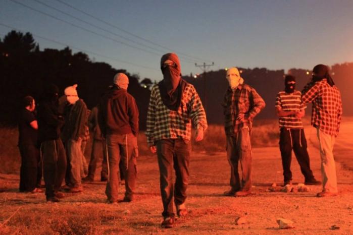 Israeli colonists attack Palestinian in central West Bank, set vehicle on fire