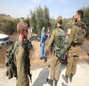 Israeli soldiers attack Palestinian olive harvesters in a village near Nablus, force them to leave their lands