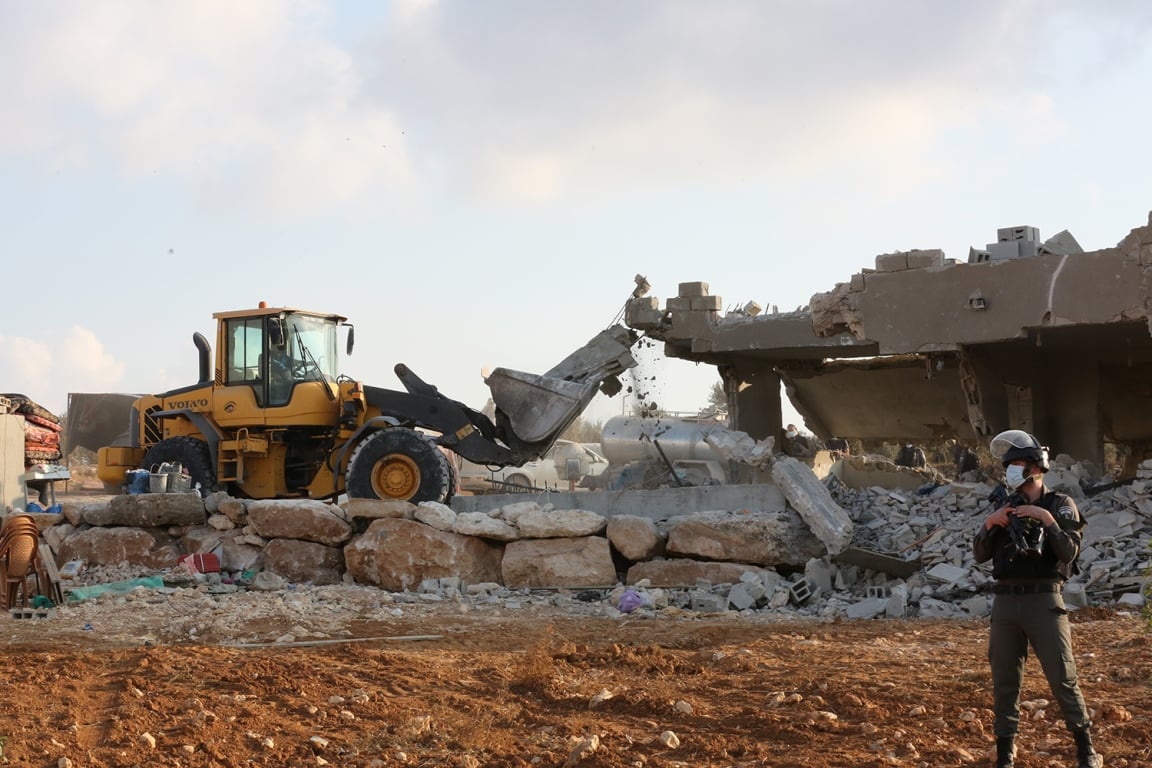 Israel razes Palestinian stores in Jerusalem-district town