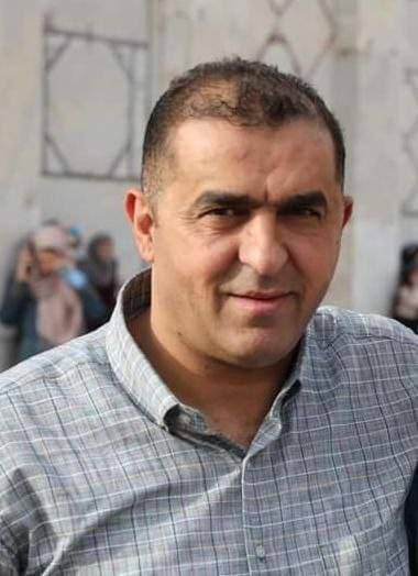 Israeli police detain an injured Palestinian man while at his hospital bed