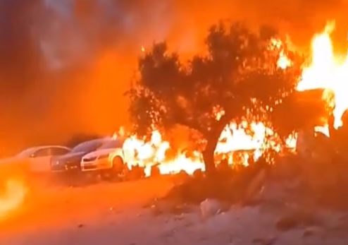 Israeli colonists set fire to agricultural lands and vehicle scrapyard south of Nablus 