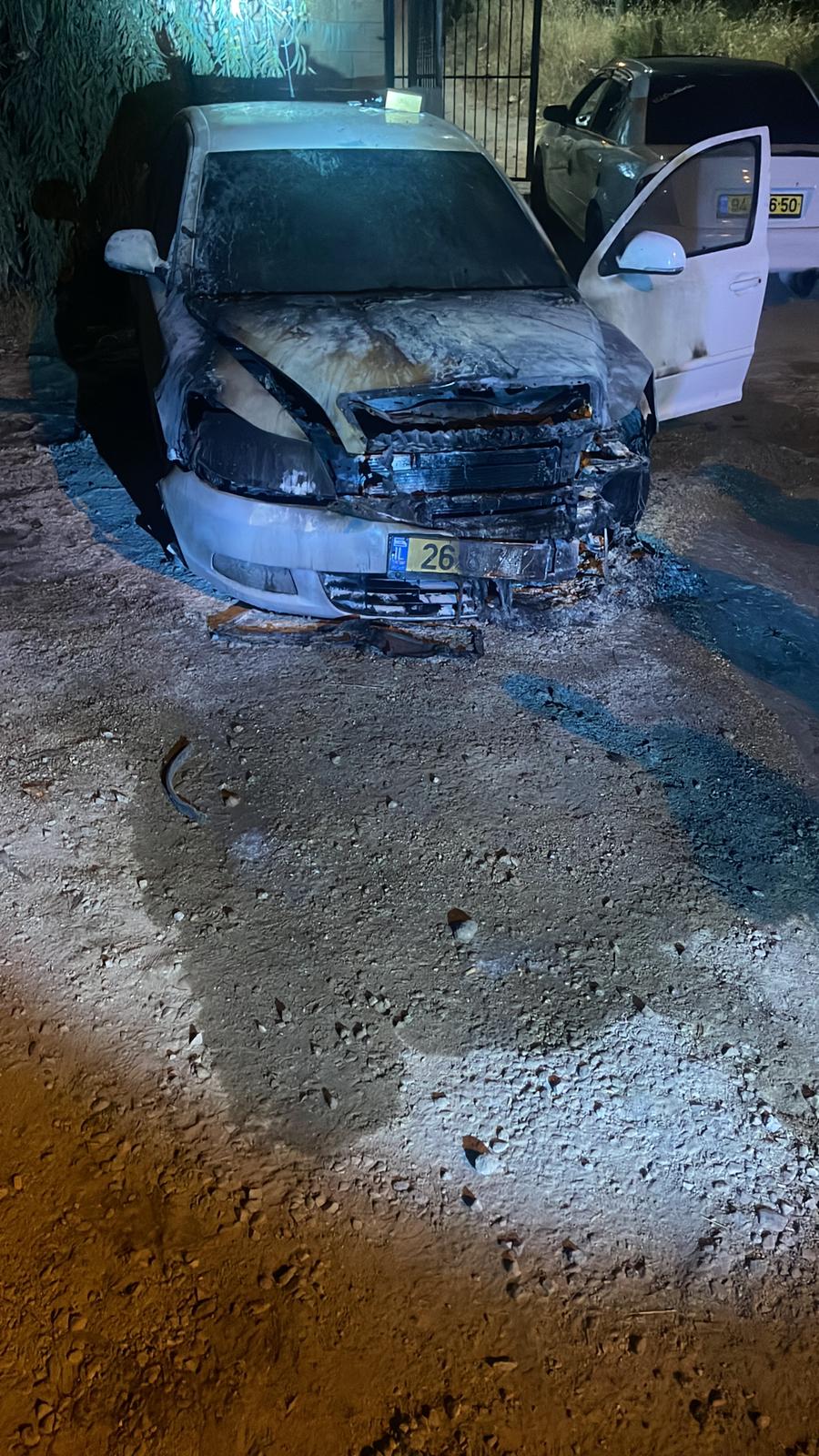 Jewish settlers torch Palestinian-owned car in a Jerusalem-area village