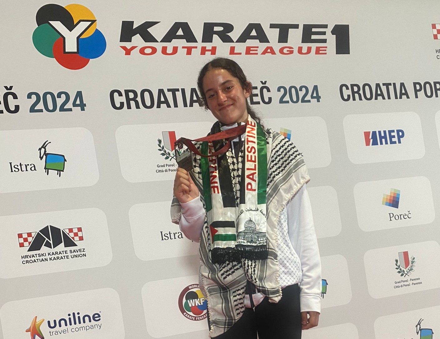 Palestinian player wins gold medal in World  Karate Junior and Youth Championship