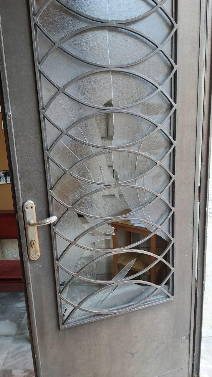 Israeli occupation forces raid the premises of a Ramallah church, wreck entrance and smash door’s glass