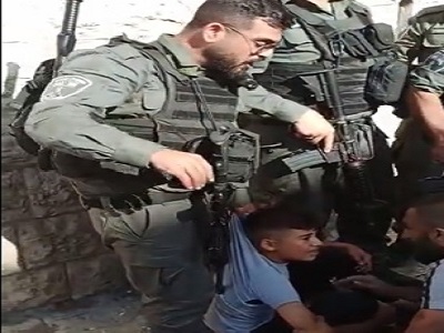 Israeli police vehicle runs over a Palestinian boy for raising Palestinian flag