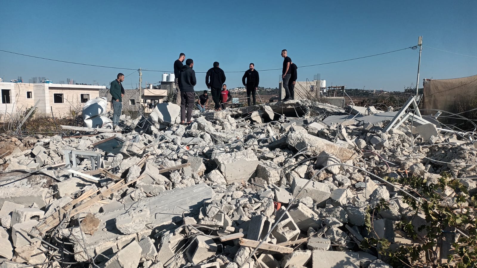 Israeli forces demolish two houses, water pond near Hebron