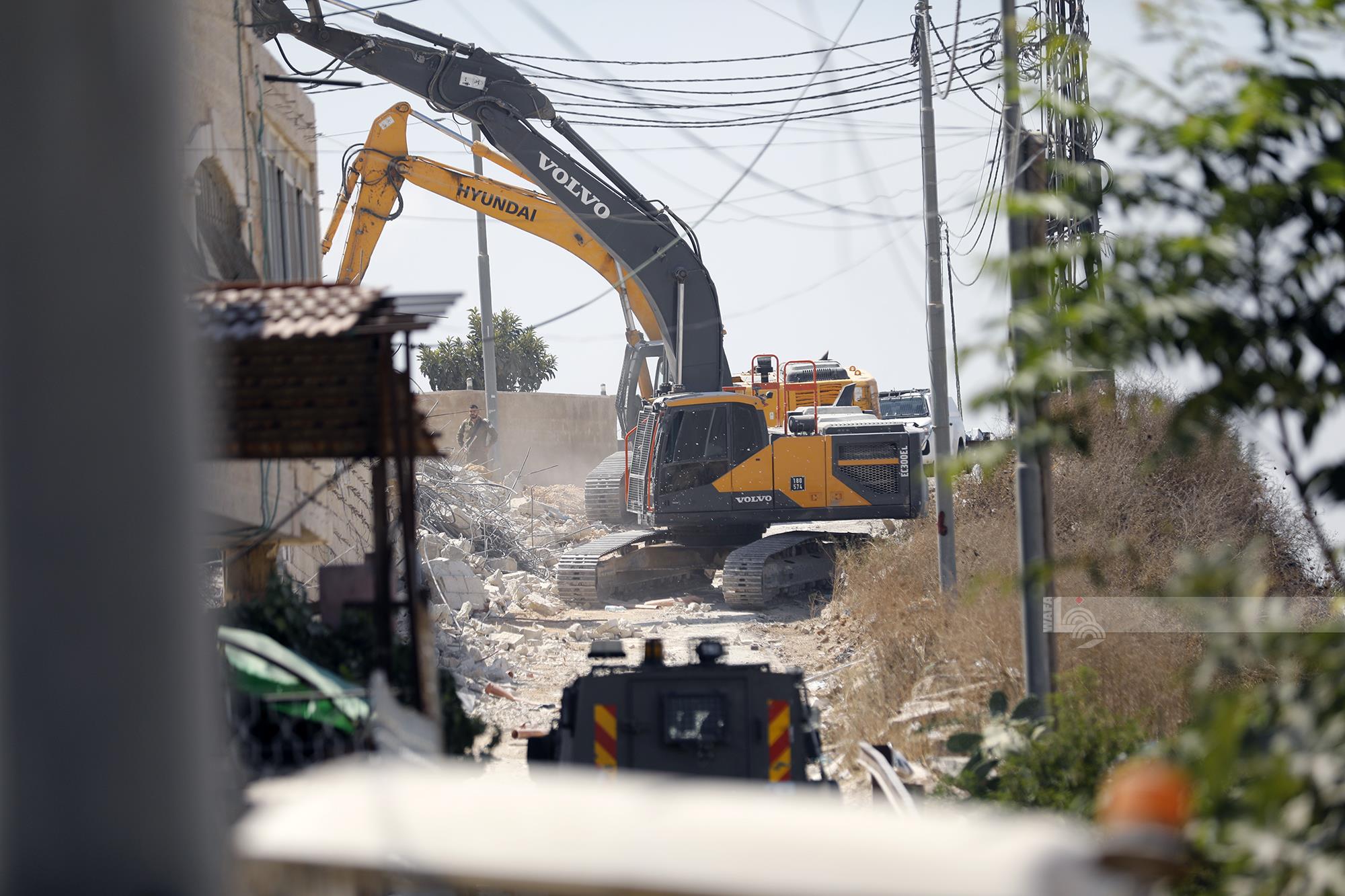 Israeli forces demolish house, commercial store near Jerusalem