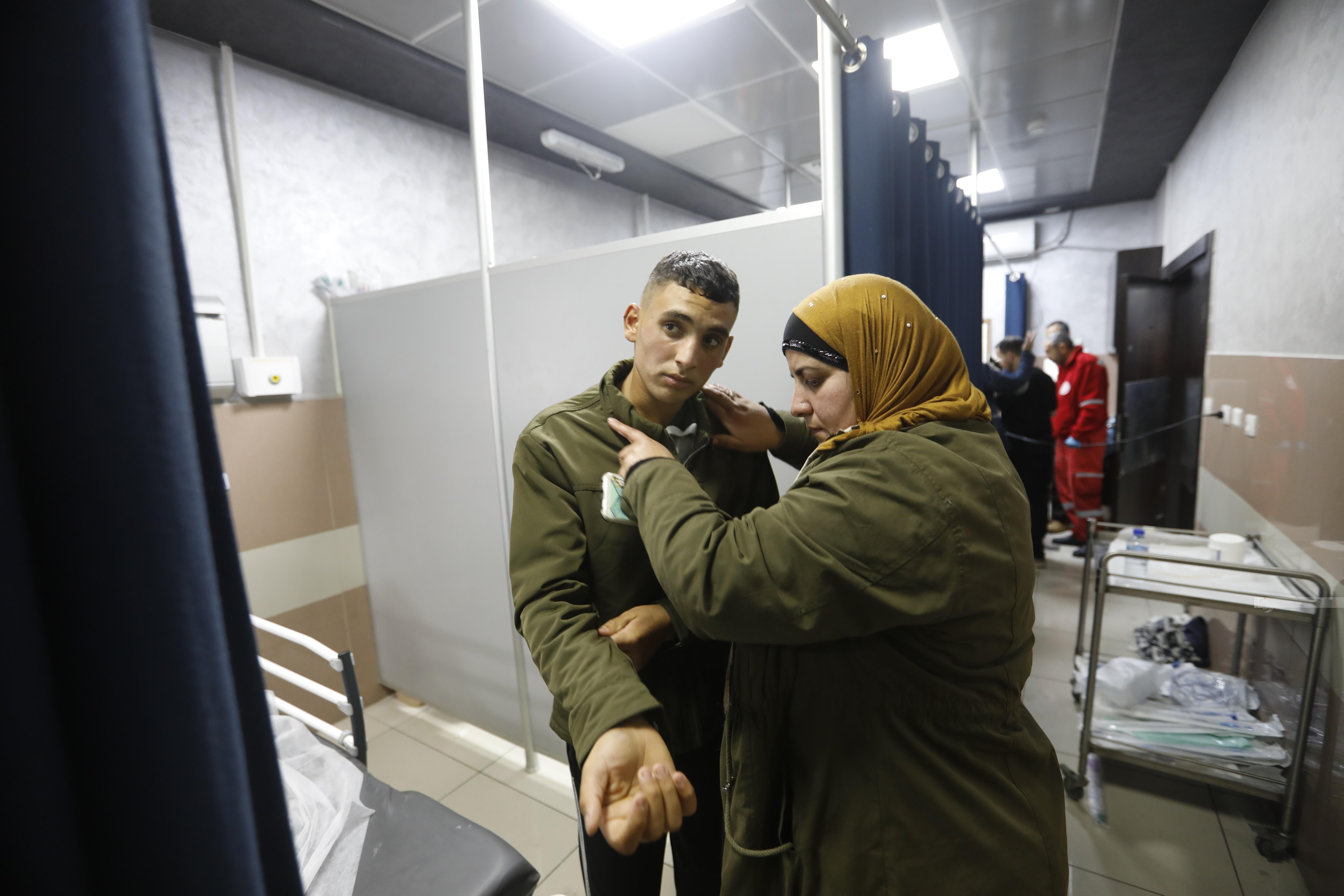 After 10 days in detention, a Palestinian teenager says soldiers shot him and his cousin without any reason