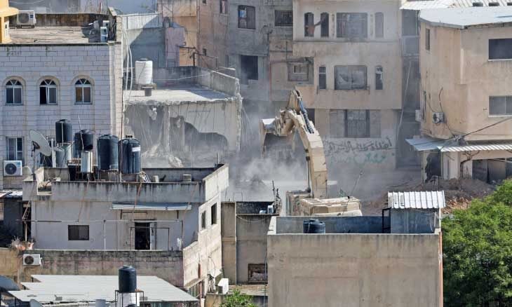 Occupation forces demolish buildings amid ongoing assault on Tulkarem