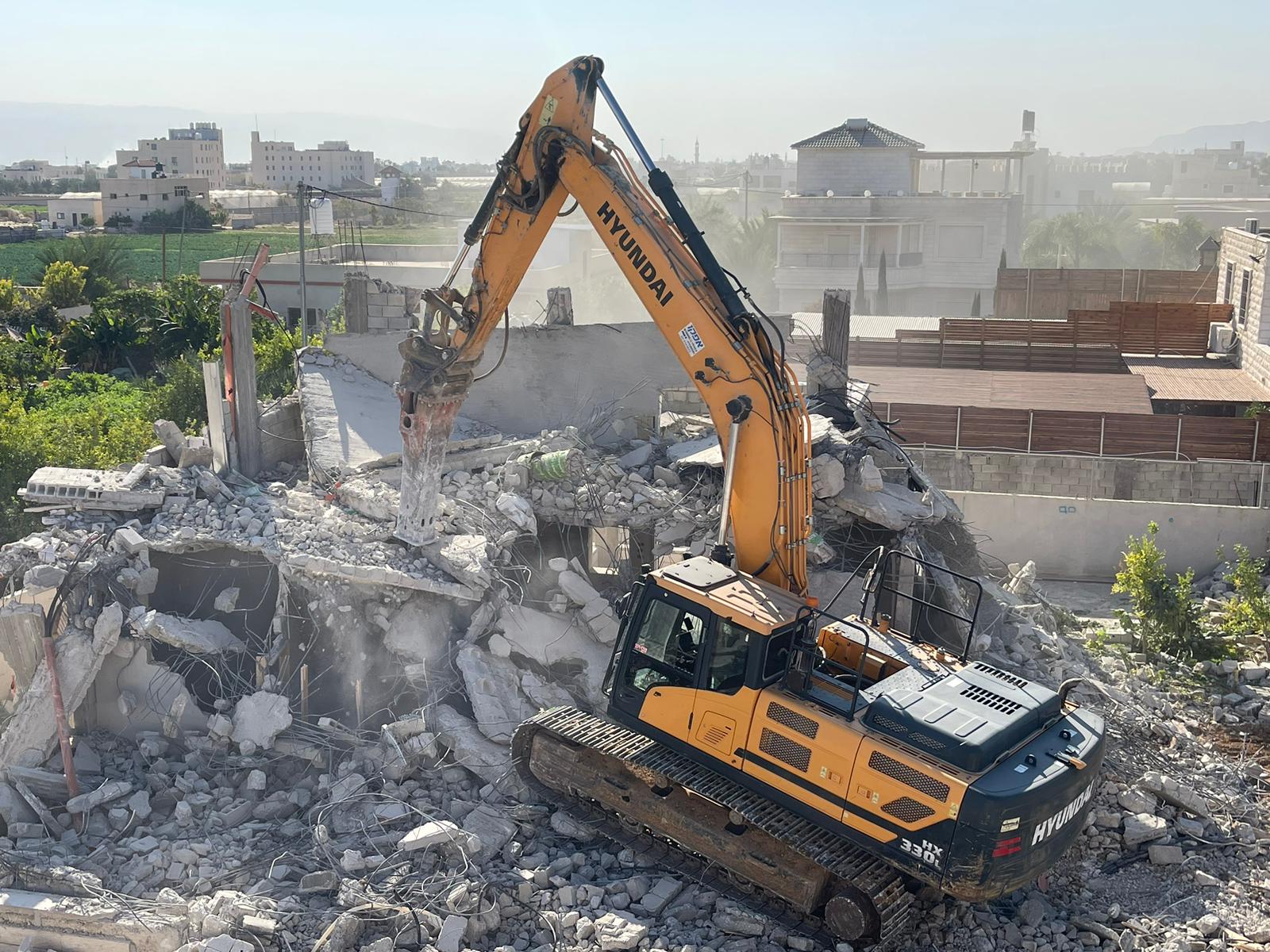 Israeli occupation forces demolish two houses out of dozens slated for demolition east of Jericho city