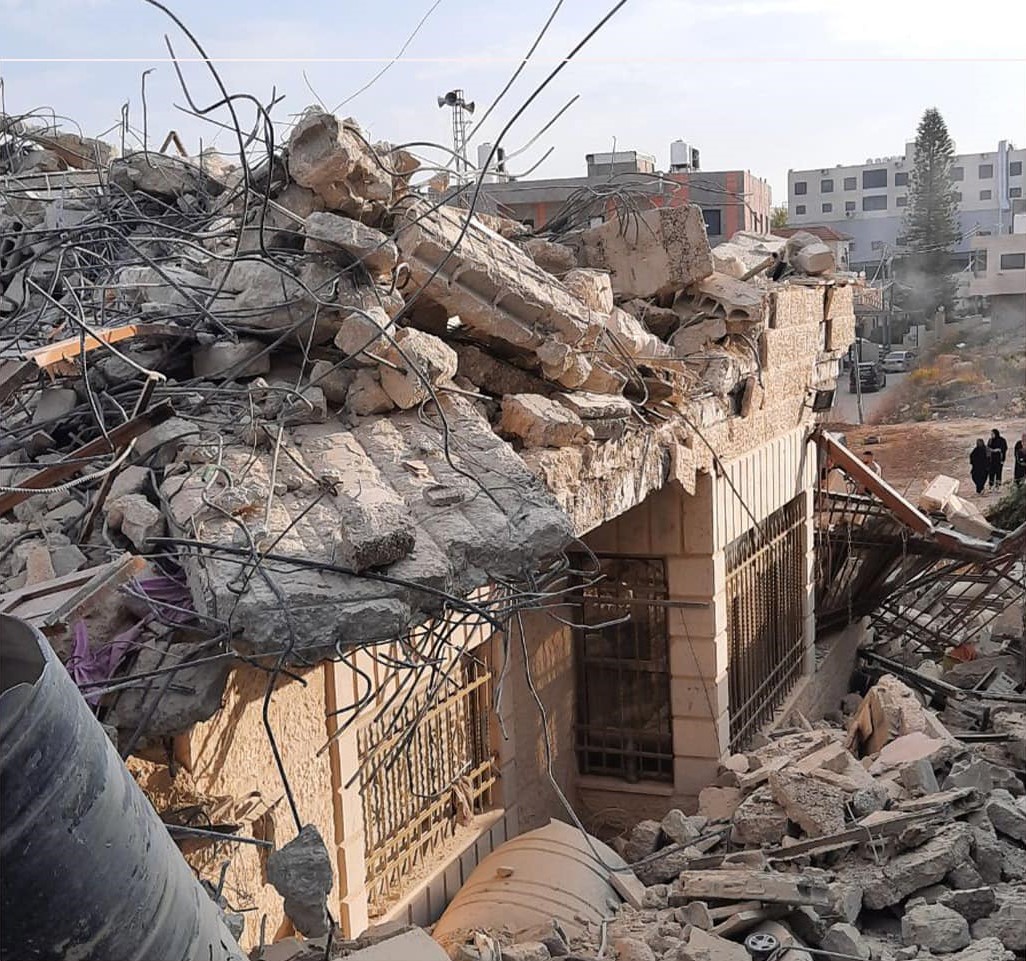 Israeli occupation forces demolish a Palestinian-owned house near Ramallah