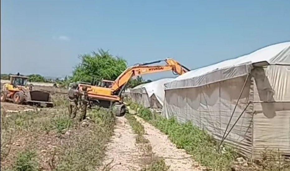 Israeli forces demolish two houses, raze greenhouses north of Tulkarm