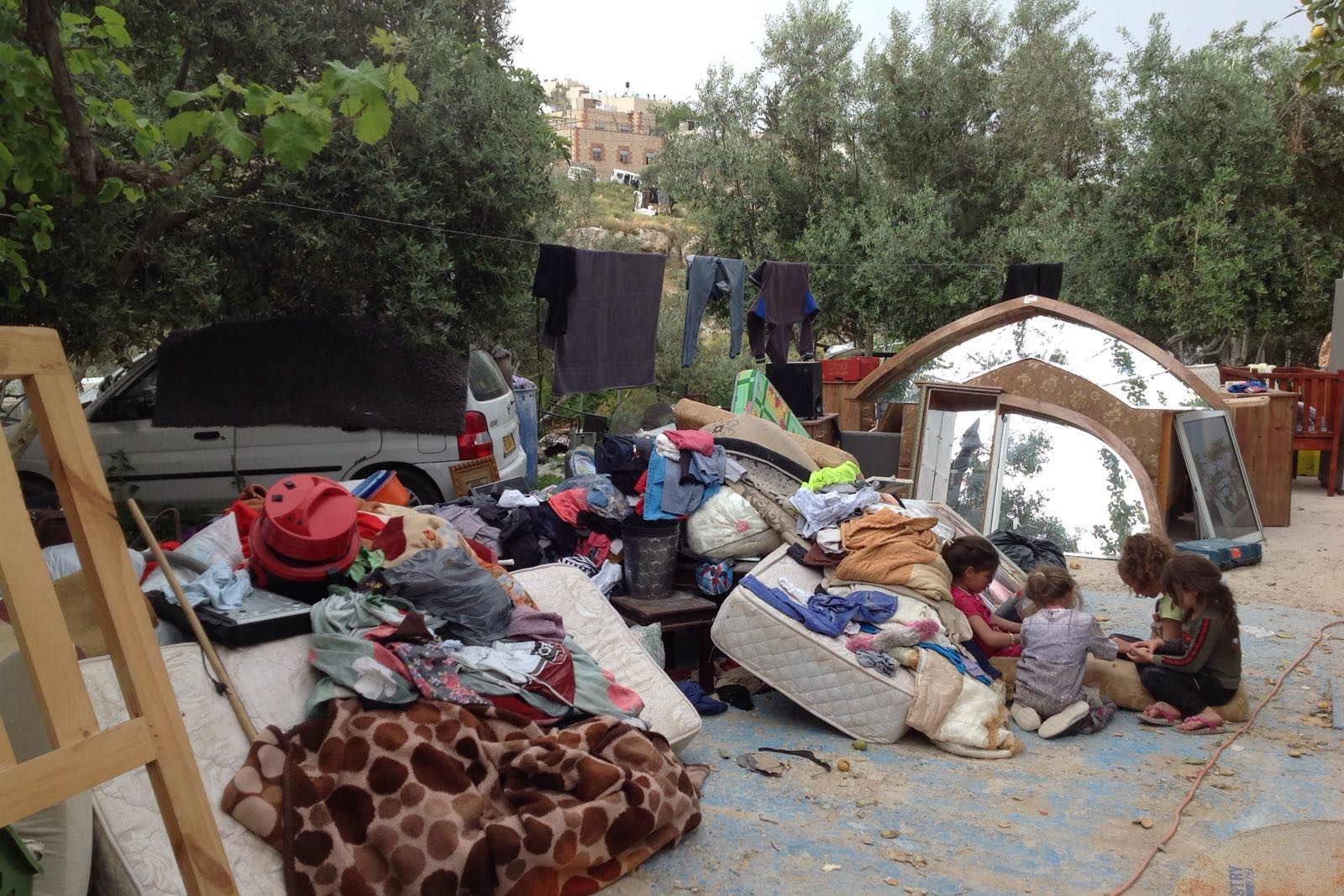 Israeli authorities force Palestinians to demolish homes in occupied Jerusalem