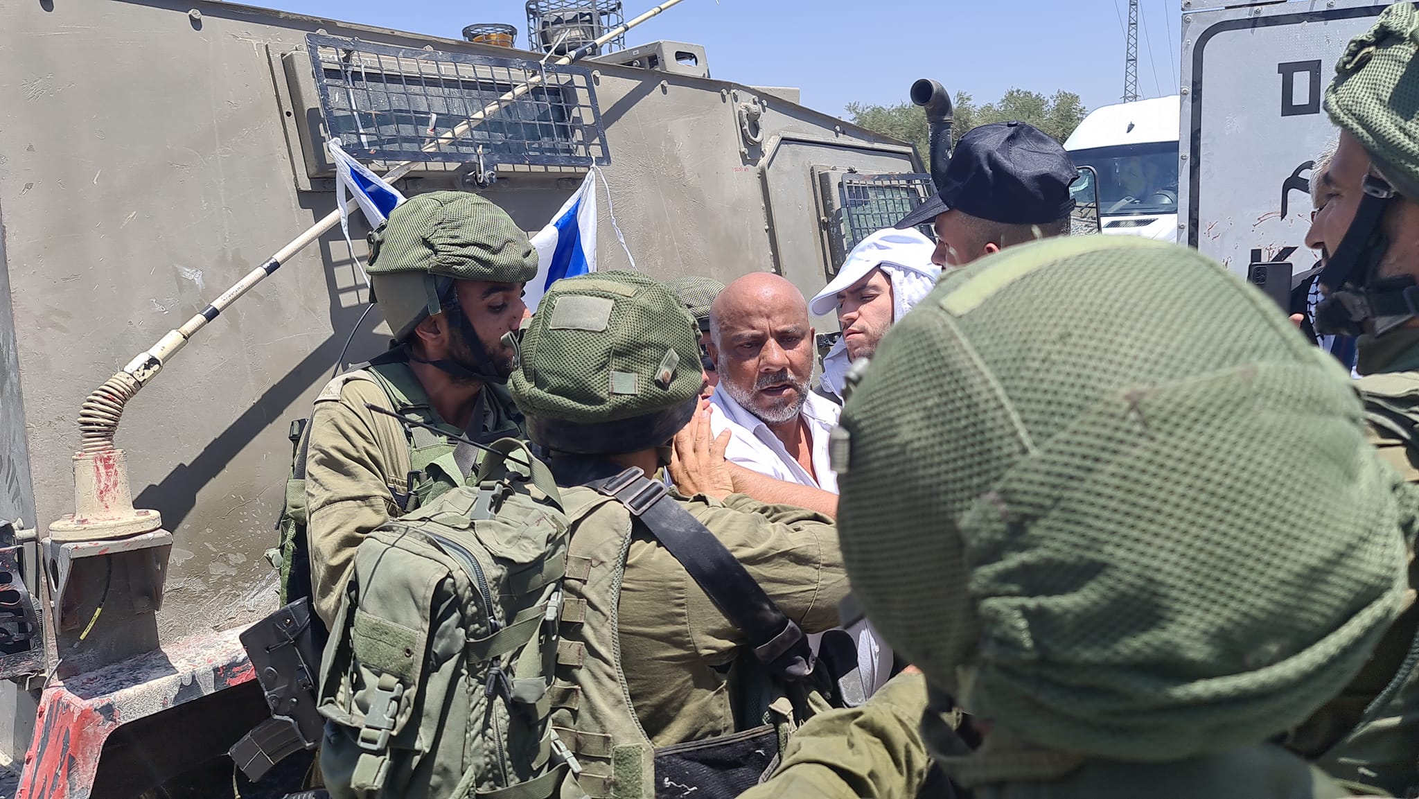 Palestinian official briefly held by Israeli occupation forces who assaulted participants in a peaceful protest